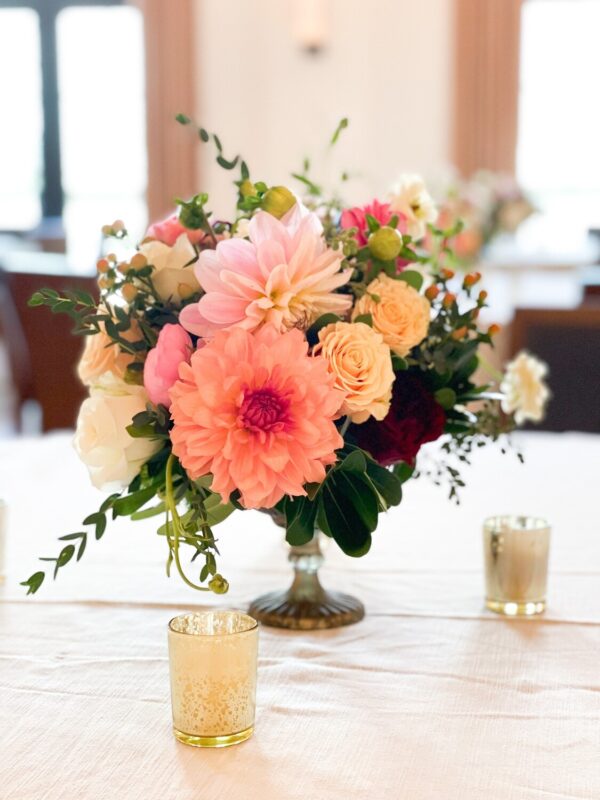 flower arrangement on a table at a special event