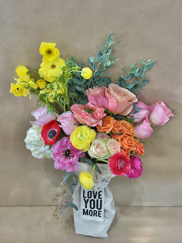 multicolored bouquet for a special occasion that says "love you more"
